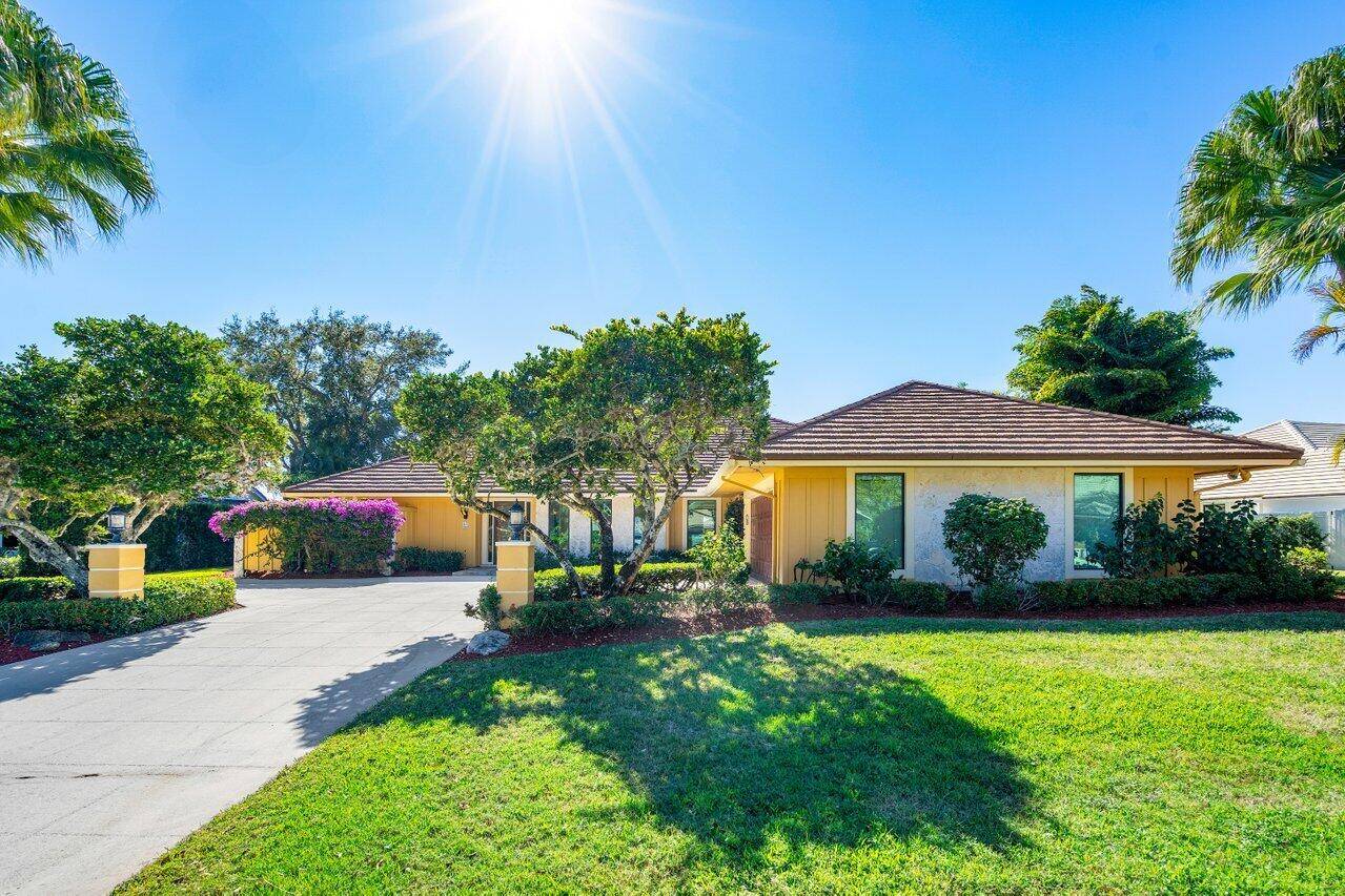 Experience the pinnacle of elegance with this exceptional residence, perfectly positioned to capture 10 out of 10 southern exposure on the sparkling wide lake of Marlwood Estates and the renowned ...