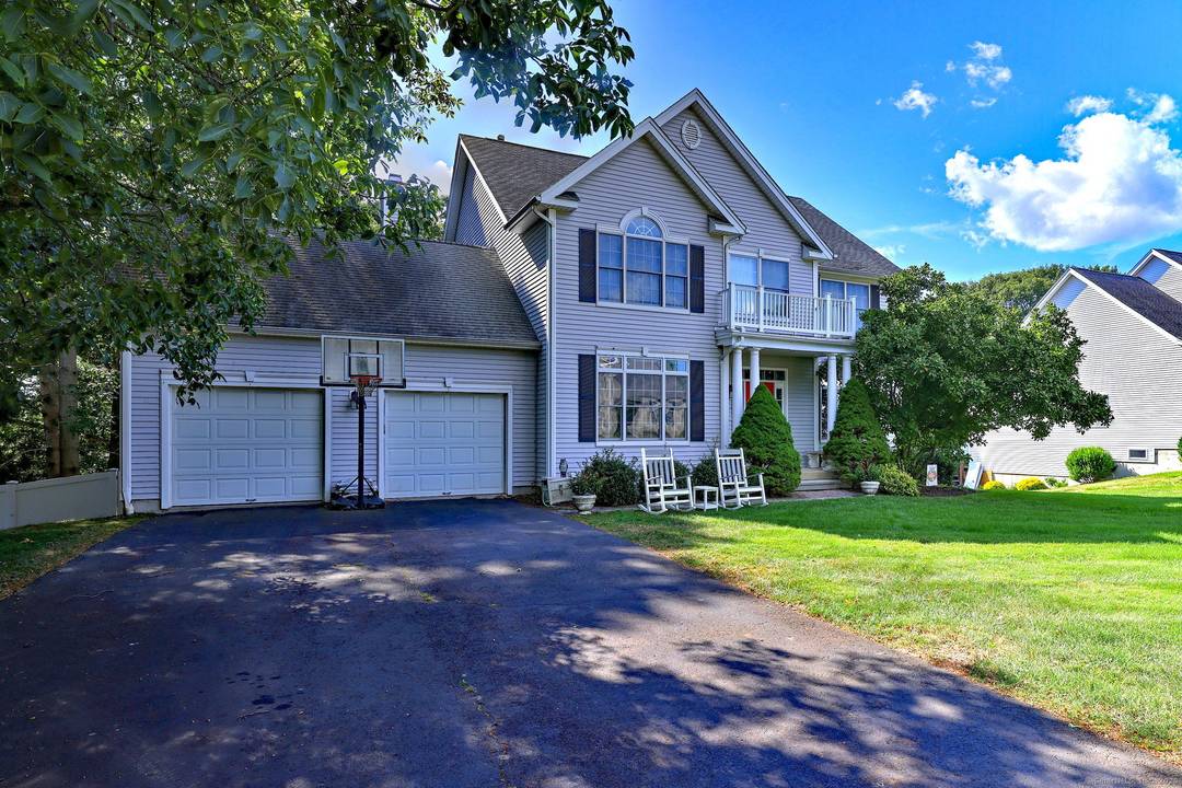 This spacious custom Colonial is nicely perched high on 0.