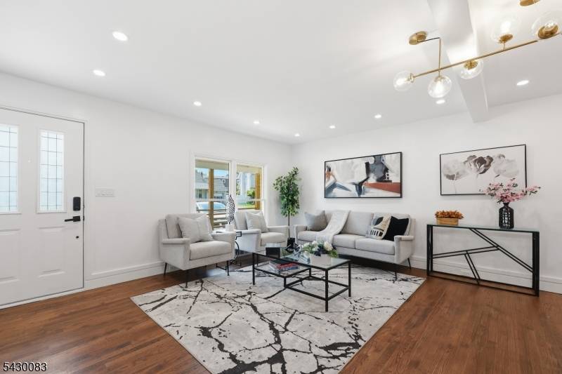 Welcome to this updated 4 bedroom 3 full bath home in the heart of Colonia.
