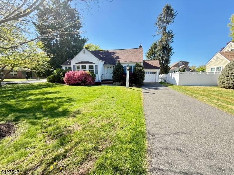 PROF PIC 4 30 Charming and rich in character, this classic Cape Cod offers a beautiful blend of timeless detail and a flexible floor plan.