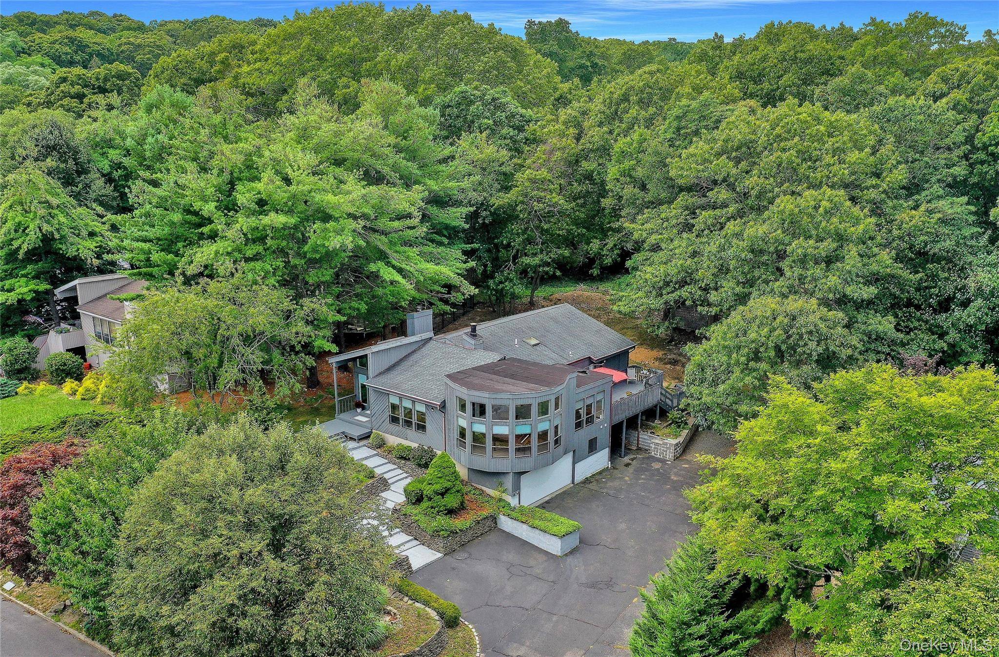 Stunning Updated Split Level home in beautiful Harbor Hills Pack your bags and bring your Dreams !