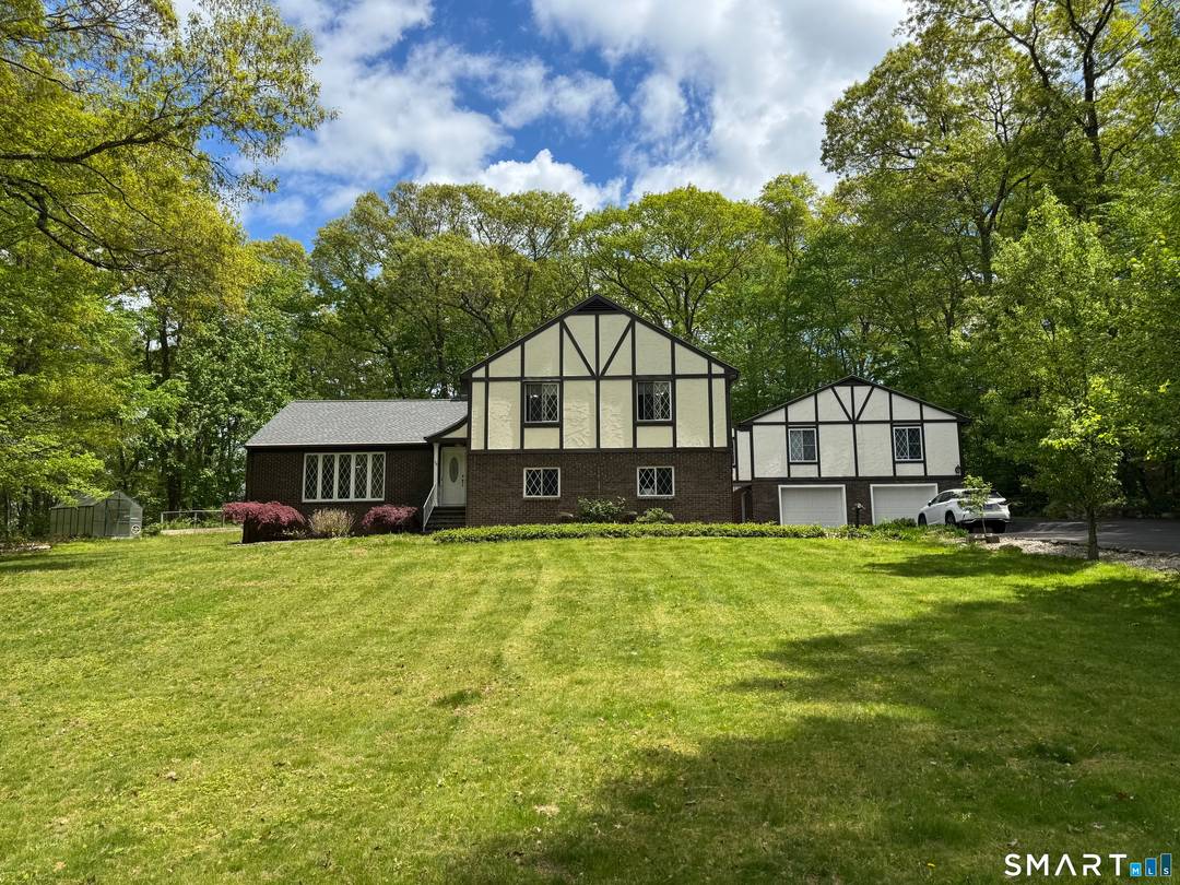 Buyers who need an extra room for possible in law, additional 900 sf above garage has three rooms and Bar kitchenette, hardwood floors, bathroom and separate entrance.