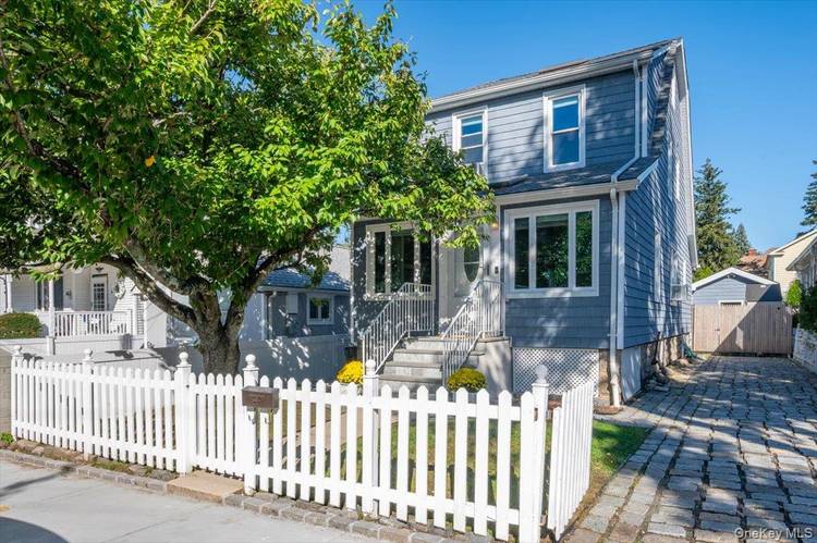 Enjoy the charm of City Island living at this inviting three bedroom, two bath home, where original hardwood floors and crown moldings pair beautifully with thoughtful updates and comfortable spaces ...