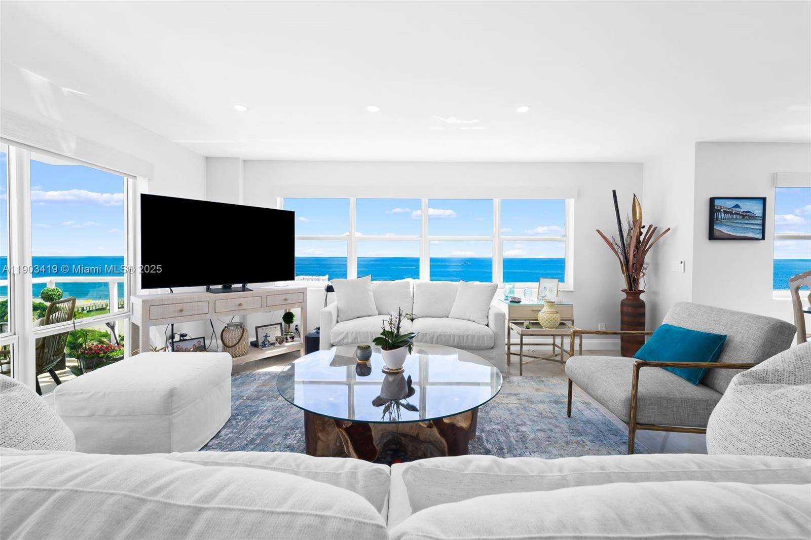 BEACHFRONT DREAM ! ! This property has been turned inside out with TOP OF THE LINE UPGRADES.