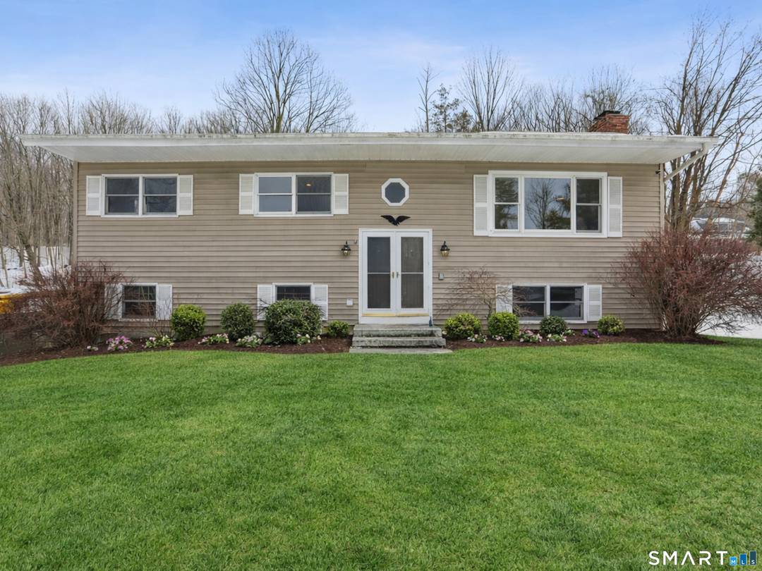 Welcome to this beautifully maintained 4 bedroom, 3 full bath high ranch in the highly sought after King Street area of Danbury, set on a quiet cul de sac just ...
