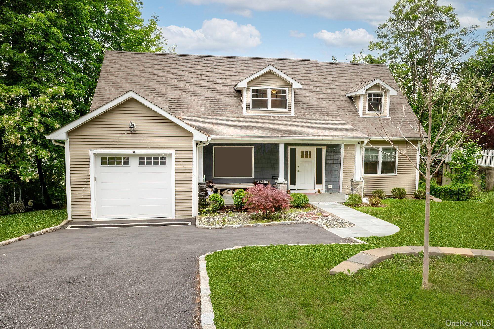 Welcome to this stunning newer built home situated on a serene cul de sac with a charming stone front porch, offering timeless curb appeal and a warm welcome.