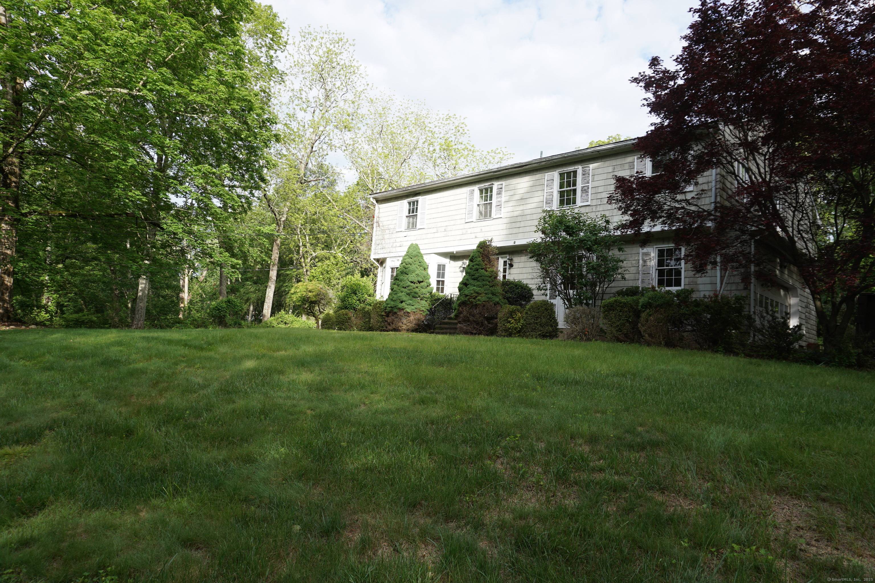 Diamond in the Rough ! This stately colonial is brimming with potential and ready to be restored to its former grandeur.