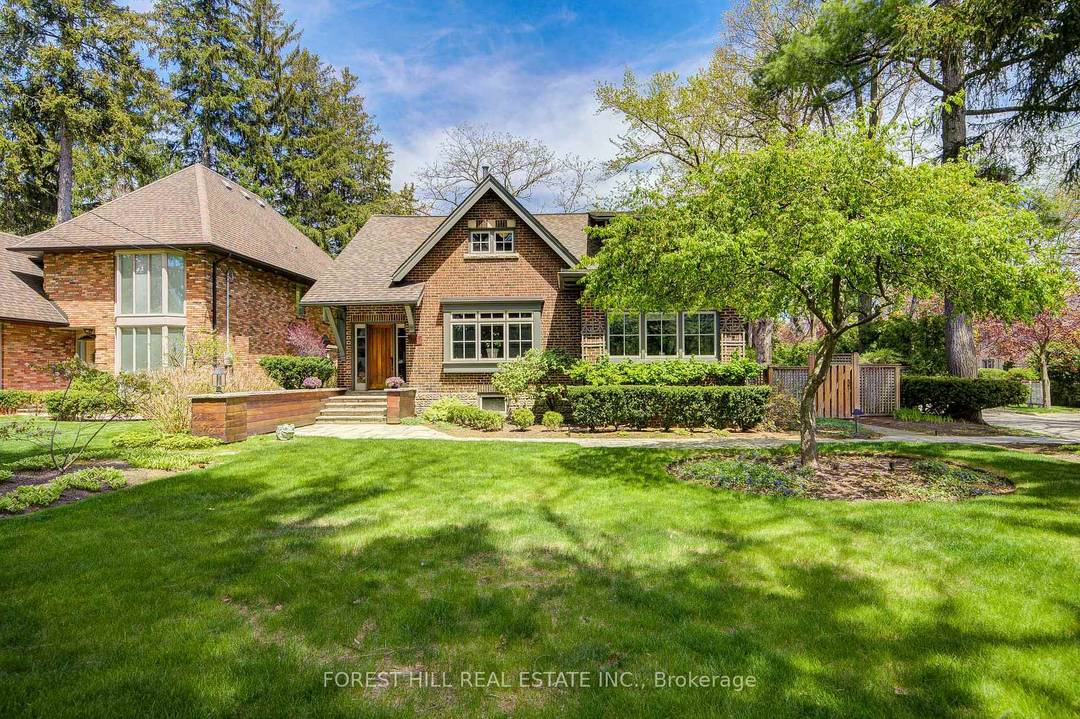 Distinguished arts and crafts residence in prestigious Lorne Park, where timeless architectural character meets modern convenience.