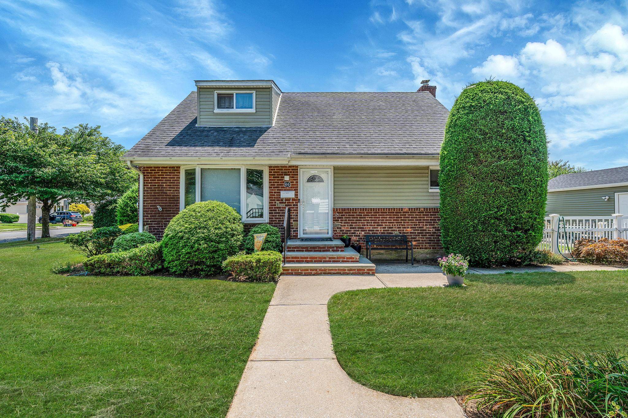 Welcome to this charming 4 bedroom, 2 bath Cape nestled on a spacious corner lot !