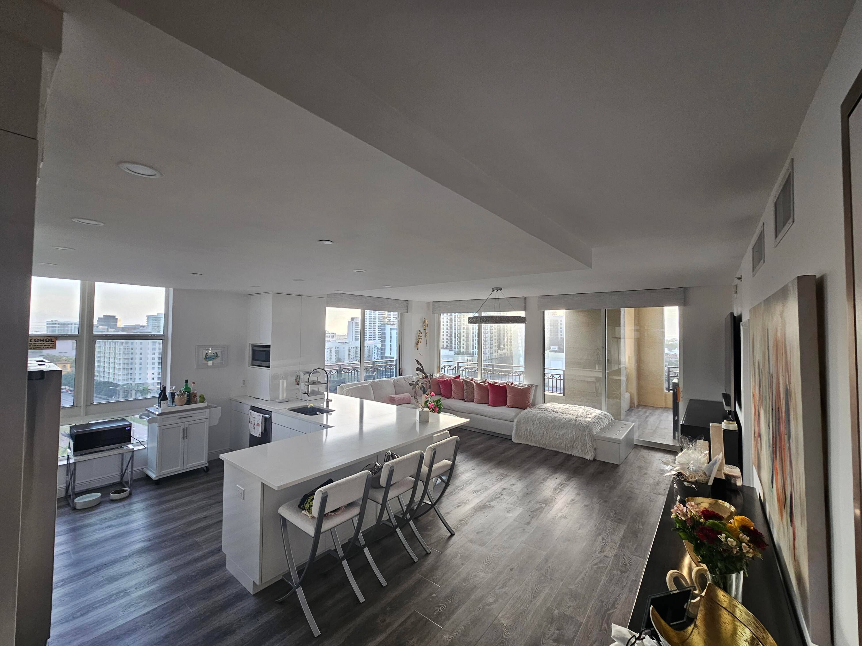 Stunning views of the Ocean and Intercoastal waterways from this NE corner 3 2 renovated condo in downtown WPB.