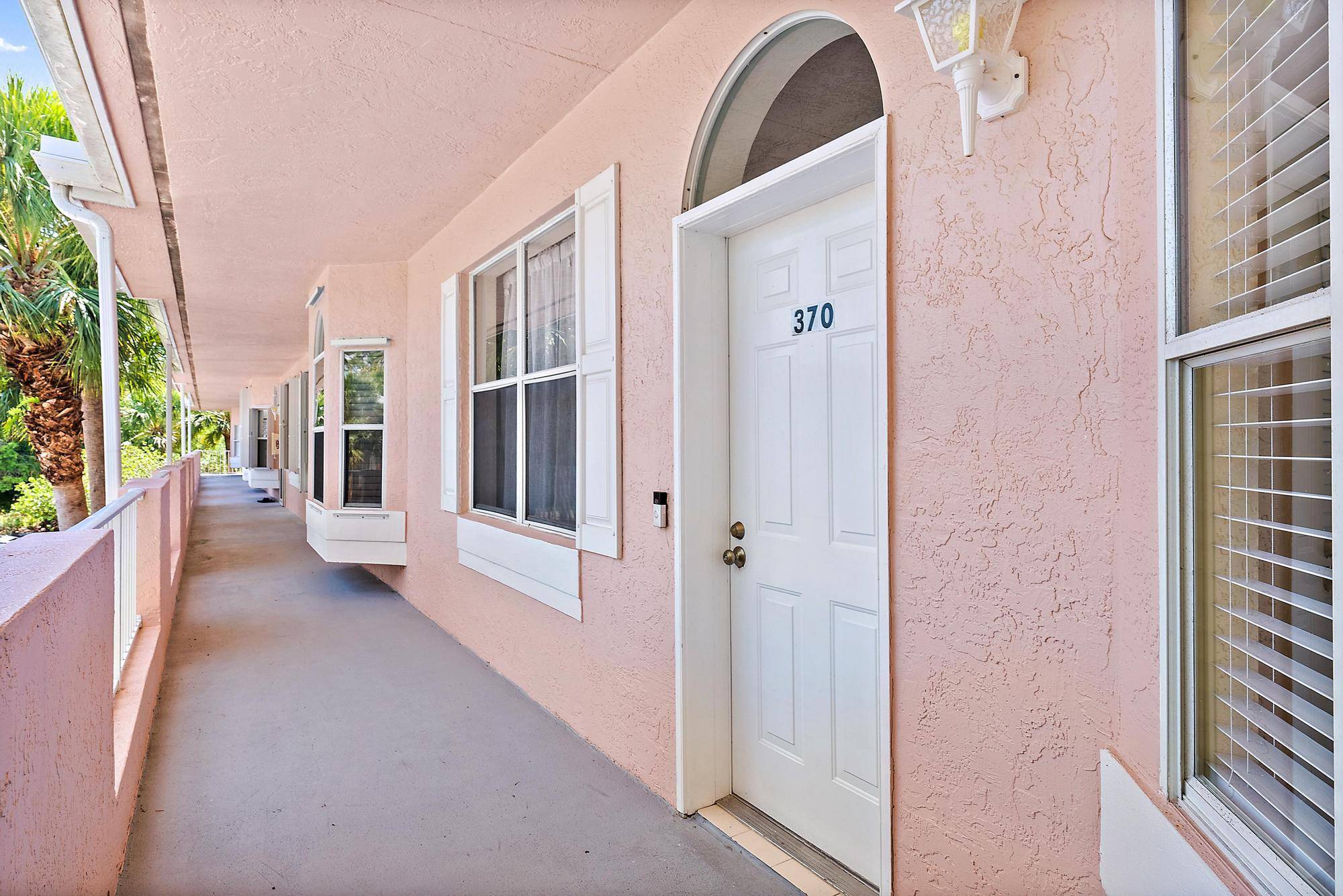 Welcome to this beautifully renovated 2 bedroom, 2 bathroom condo located in the desirable 55 community of Little Club in Tequesta.