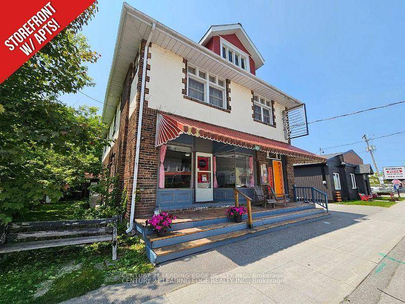 Unique mixed use commercial property with 3 residential units in the Heart of Coboconk !