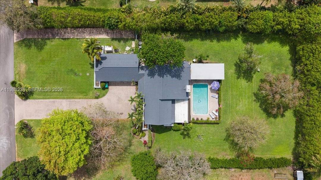 NEW LISTING ! Completely remodeled with a sleek, modern design, this exceptional residence offers luxury, comfort, and outstanding functionality on one of the area's most desirable streets.