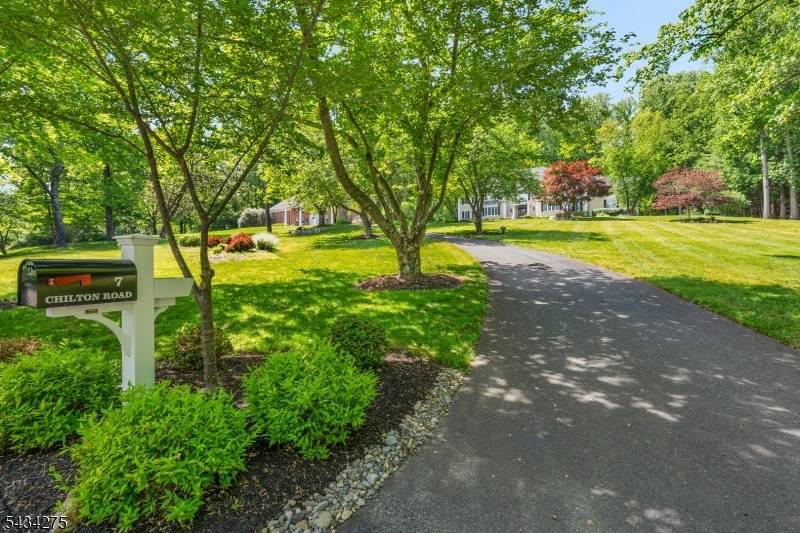Captivating Colonial set back proudly on a quiet cul de sac in a coveted Chester Twp neighborhood.