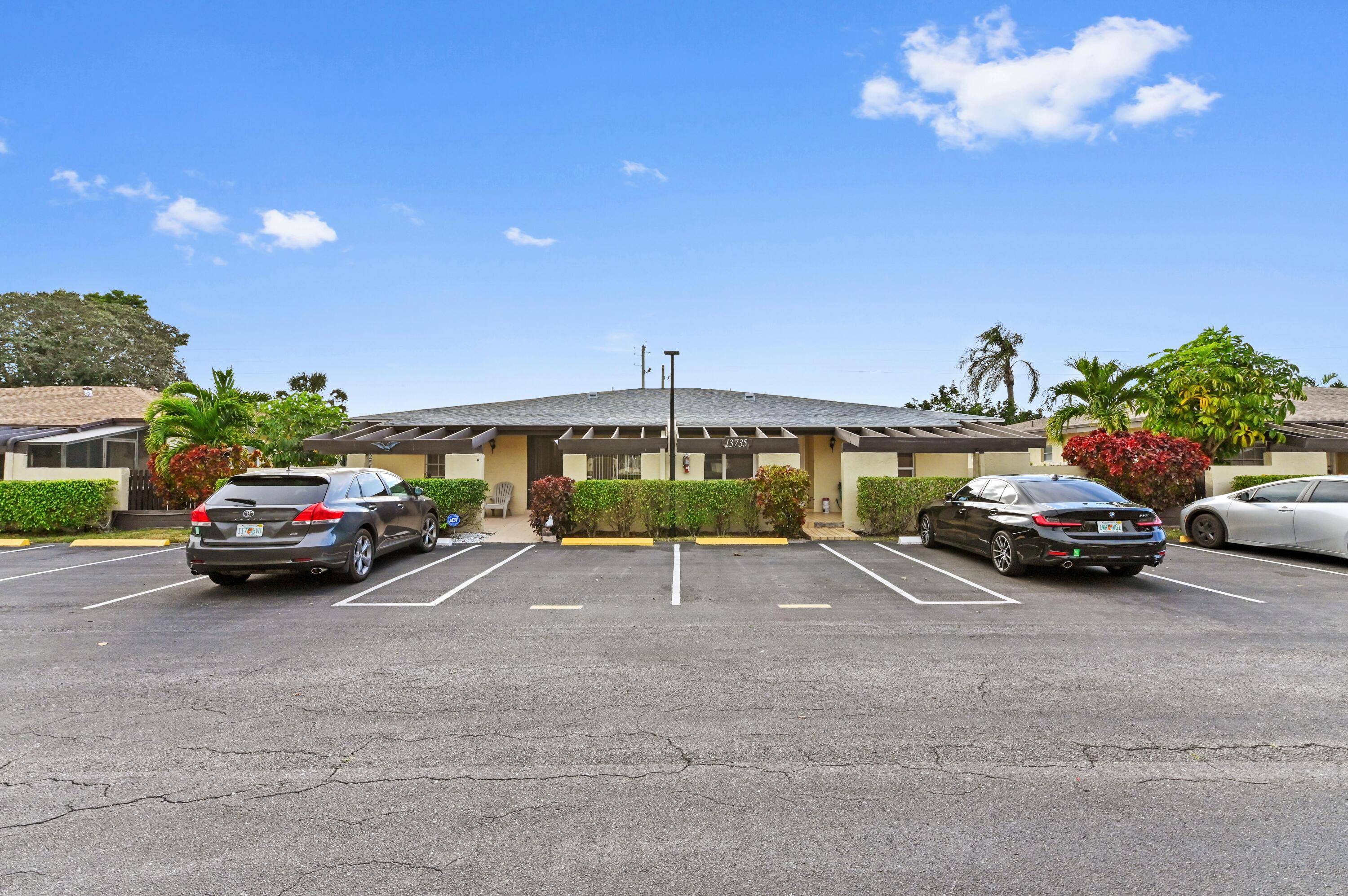This move in ready ground floor corner unit villa represents a delightful blend of style, comfort and convenience within the highly sought after 55 community of Palm Greens.