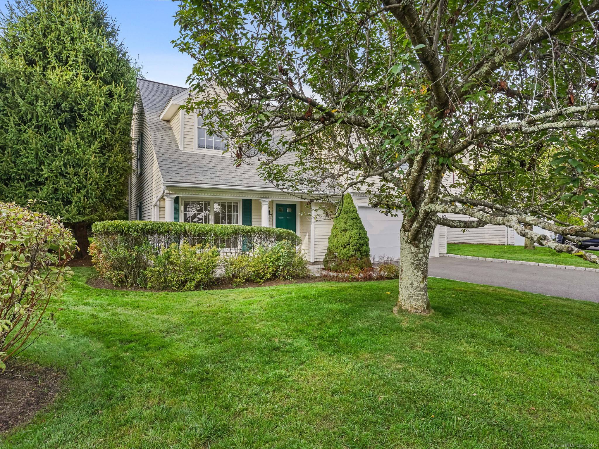 New to the market in South Wilton you'll love this easy maintenance, free standing home in the beautiful community of Grumman Hill Village !