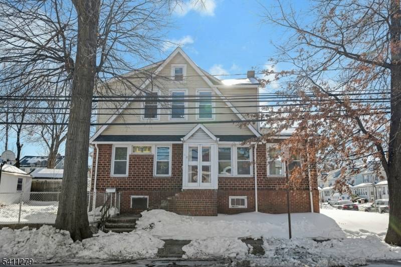 Renovated 3 bedroom, 3 bath home with finished basement, central air, driveway, and garage in Newark ?