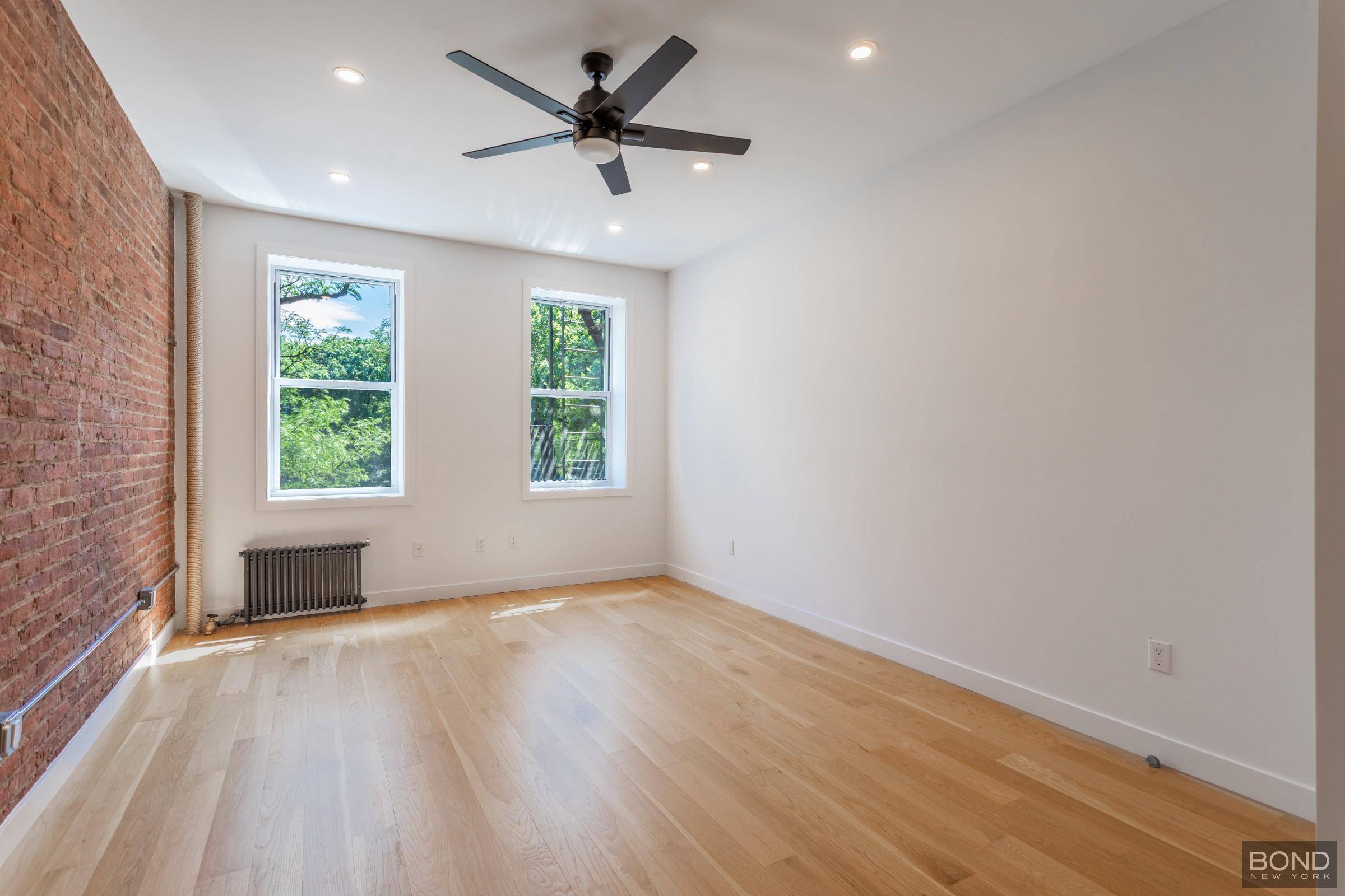 This massive floor through one bedroom apartment has recently undergone a full renovation and has carefully and masterfully created a high end 869SF loft feel apartment on the second floor ...