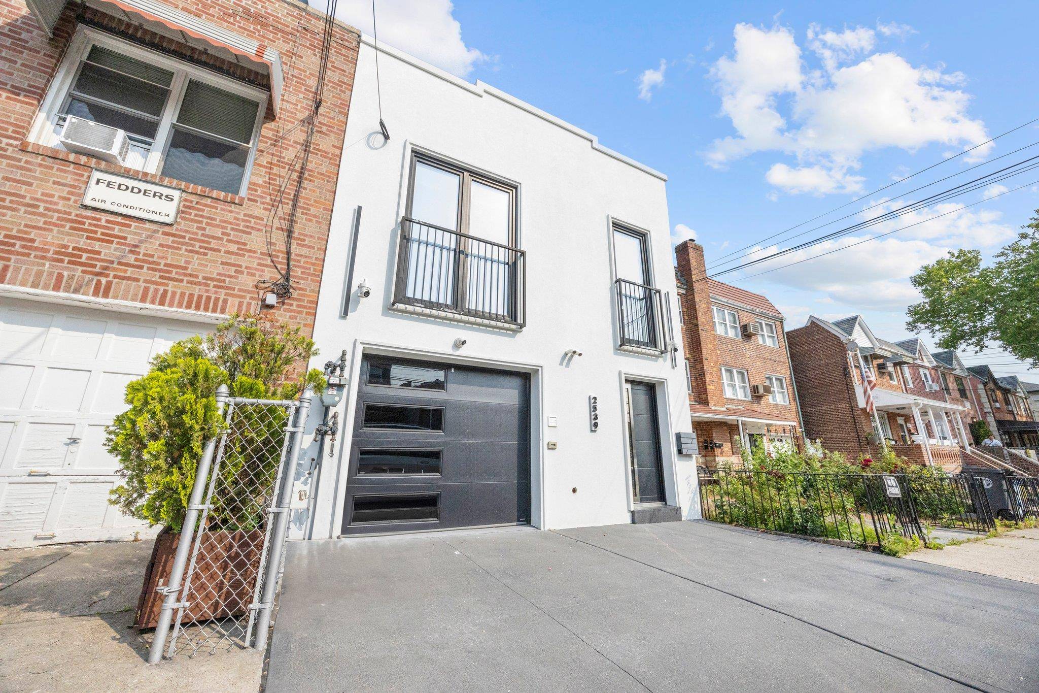 Buyers ; schedule a private showing of this newly renovated high end two family home.