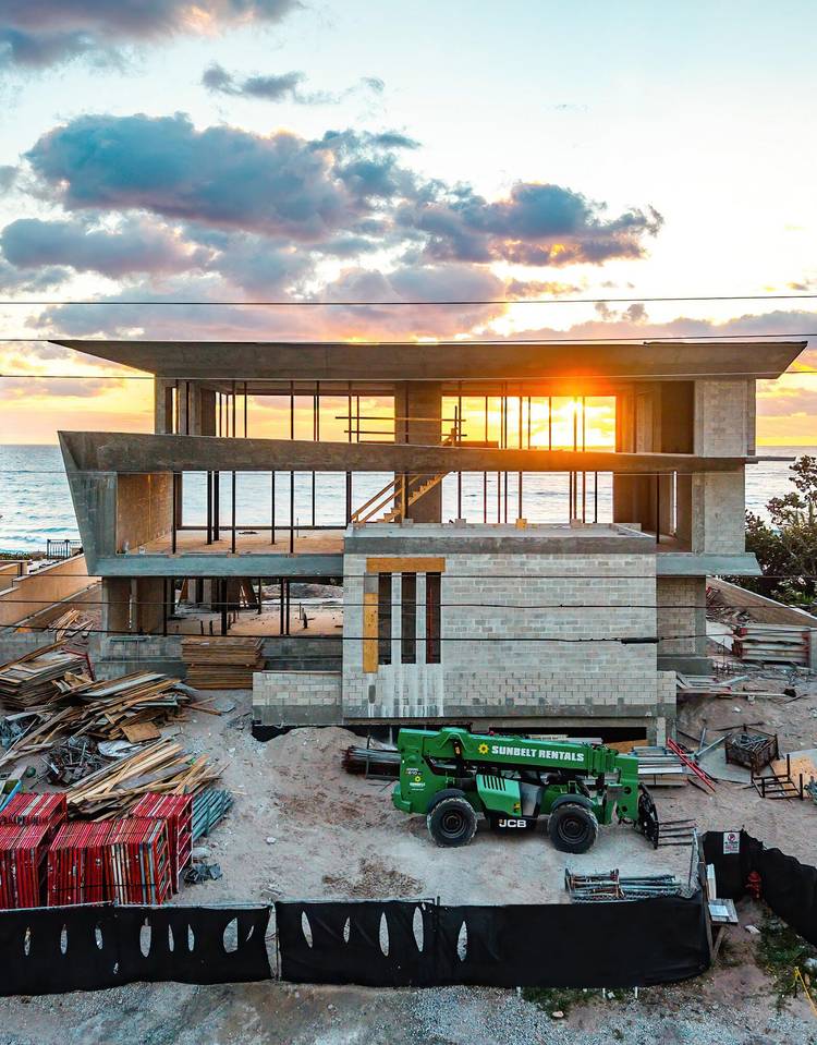 Experience unparalleled opulence in this new construction, oceanfront residence expertly crafted by Yodezeen Architectural and Design Studio in collaboration with J.
