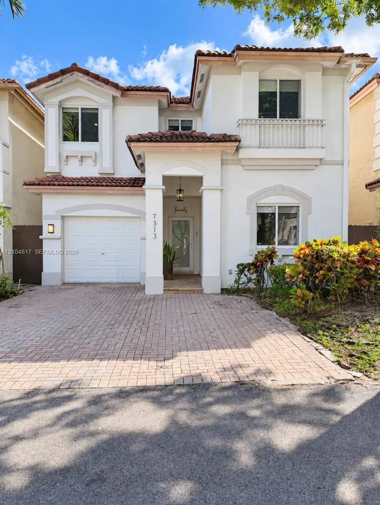 Beautifully and completely remodeled two story Single Family Coach Home in Martinique at Doral Isles, featuring 4 bedrooms, 3 full bathrooms and a family room.