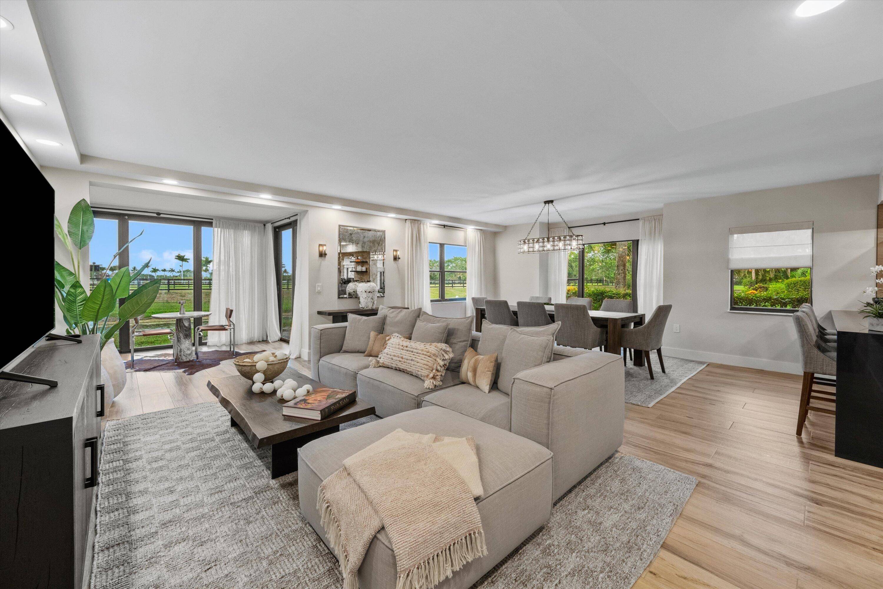 This beautifully decorated, 3 bedroom, 3 bath home has been totally renovated and offers 2, 300 sqft of luxurious living space on the gound floor.