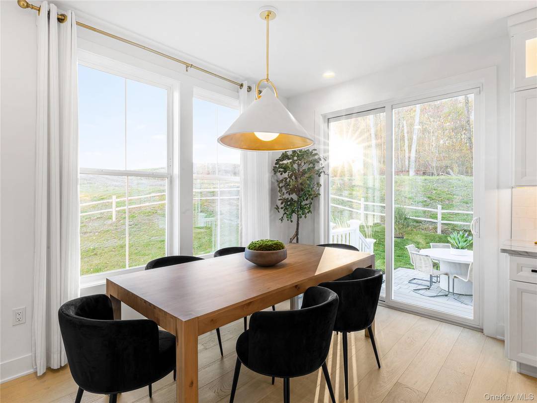 CORNER UNIT FINISHED BASEMENT WITH FULL BATH SUMMER 2026 !