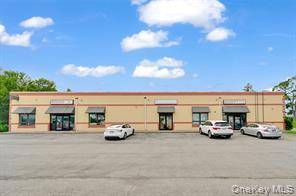 Spacious retail space being used as a skin care business.