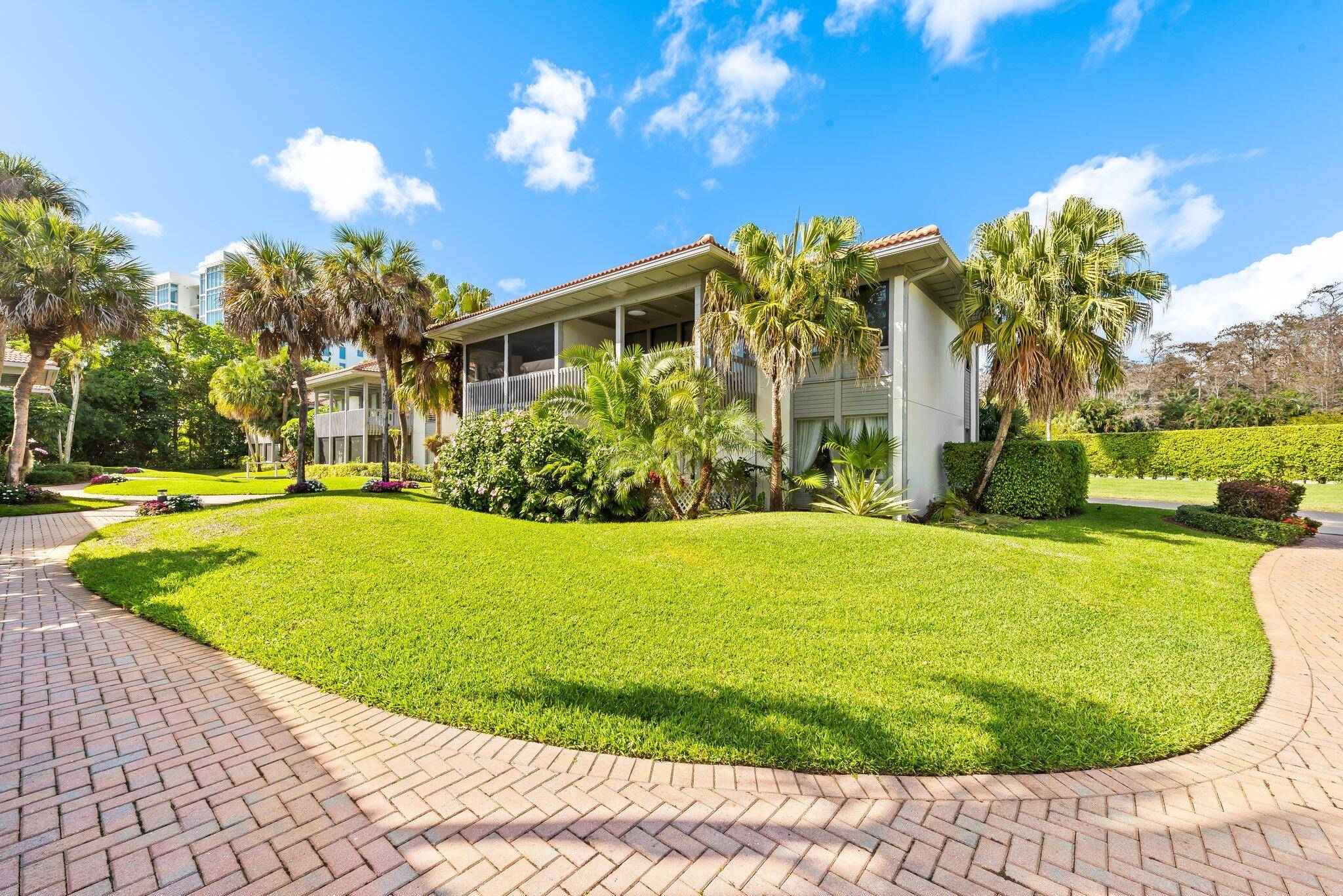 Ground floor, corner unit one bedroom suite with a lush, private patio just steps from the pool, spa, and fitness center !