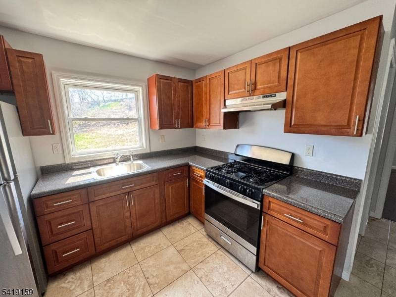 Turnkey Renovated 3 years ago 3 Family High Yield Low Maintenance.