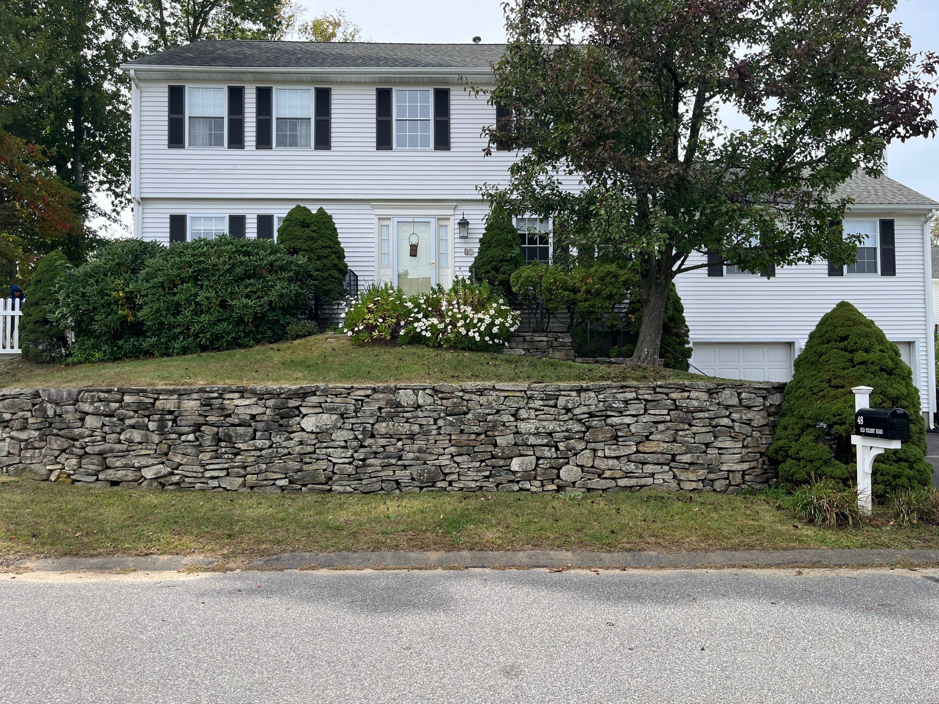 Nestled on a picturesque lot with fenced in backyard, this attractive 3 bedroom, 2.