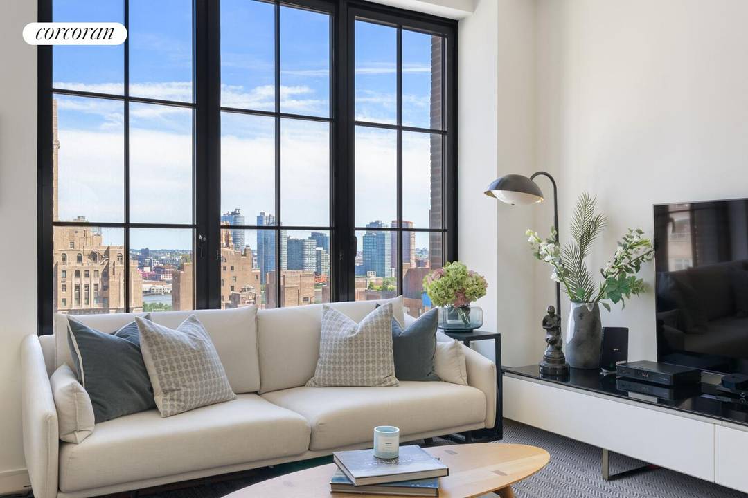 Refined Corner 2 Bedroom Condo with Split Layout and Expansive City Views at 959 First Avenue Welcome to Residence 17C a bright and intelligently designed 2 bedroom, 2 bathroom corner ...