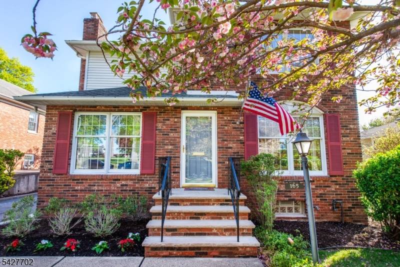 Welcome to this spacious 2500 sqft inviting center hall Colonial in the heart of Rutherford, NJ.
