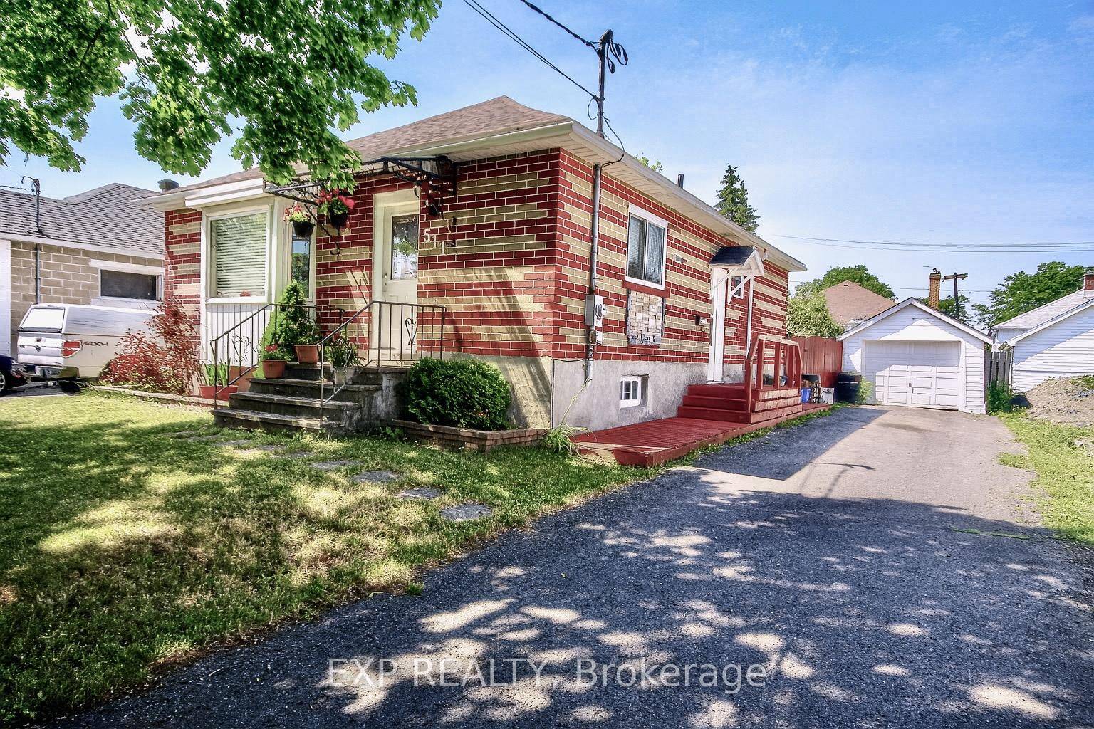 Welcome to 511 St. Felix Street, a full brick bungalow offering versatility, space, and opportunity.