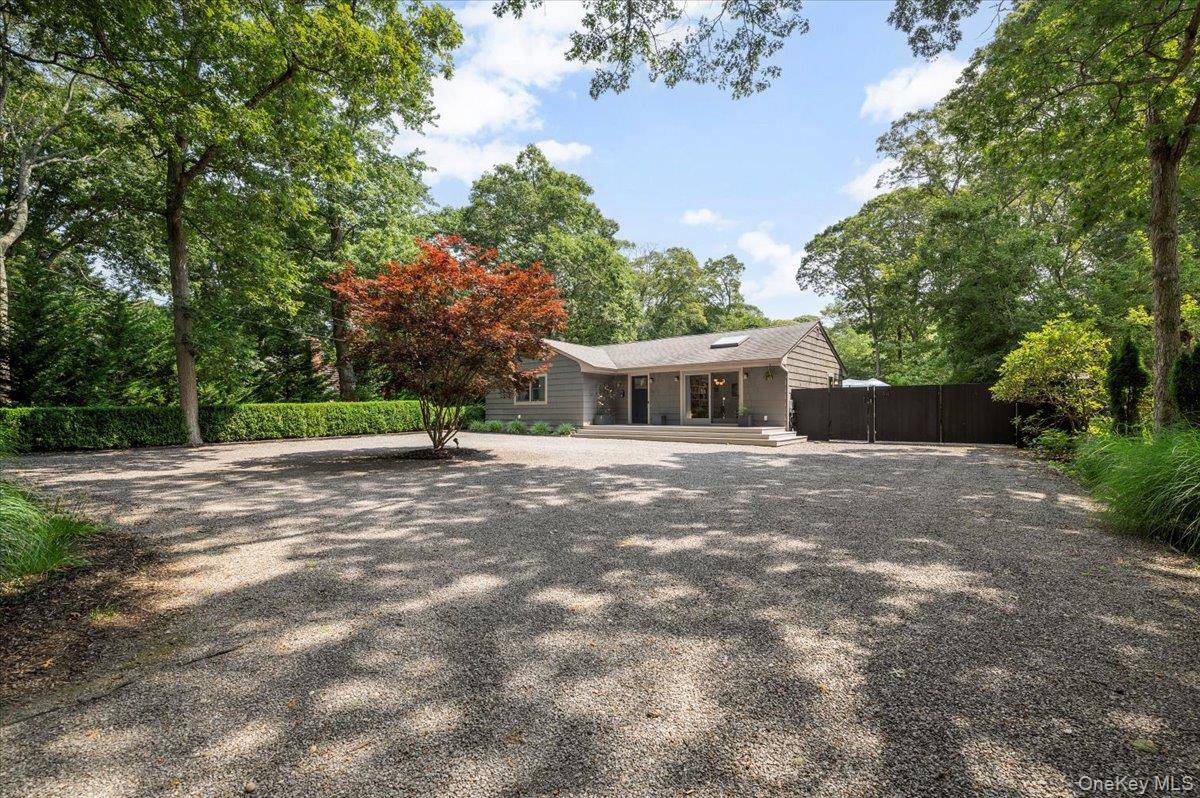 Effortlessly stylish and perfectly located, this four bedroom, three bath modern Hamptons home offers the ultimate East End escape just minutes to East Hampton Village and pristine ocean beaches.
