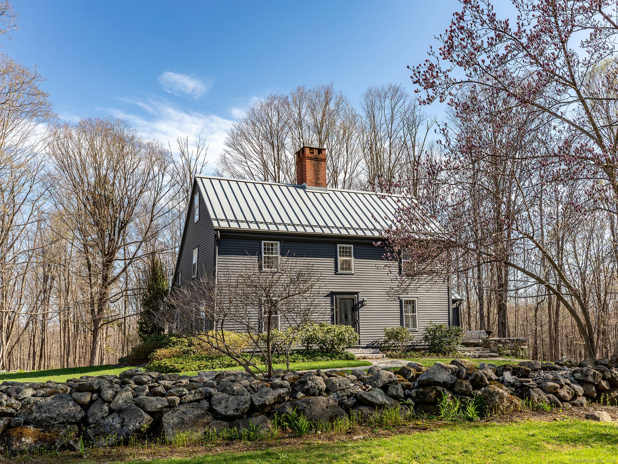 Escape and unwind in this exquisitely restored 1741 saltbox colonial the oldest home in Morris, CT !