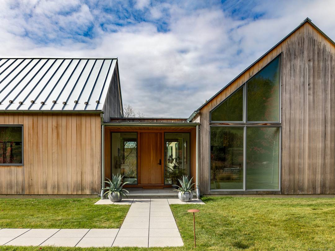 Escape to your sunlight filled, modern architectural retreat on a winding country road in Merryall, just minutes from Lake Waramaug Country Club, Bulls Bridge Golf Club, and the uber chic ...