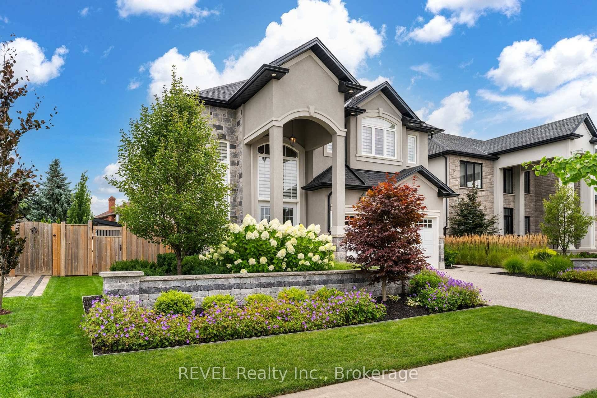 Welcome to 9 Angels Drive, a luxurious, custom built two storey home nestled in the heart of St.