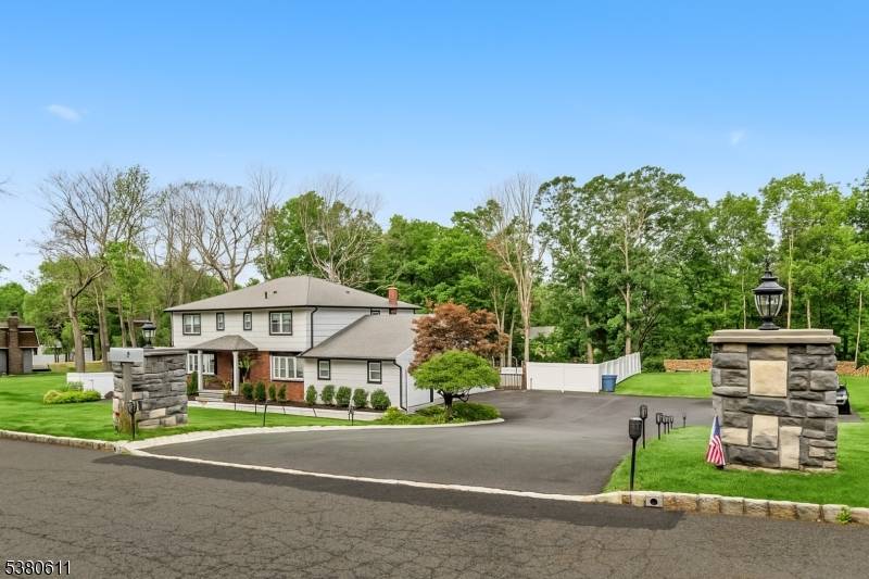 Fully renovated Center Hall Colonial in the coveted Dey Hill section of Totowa.
