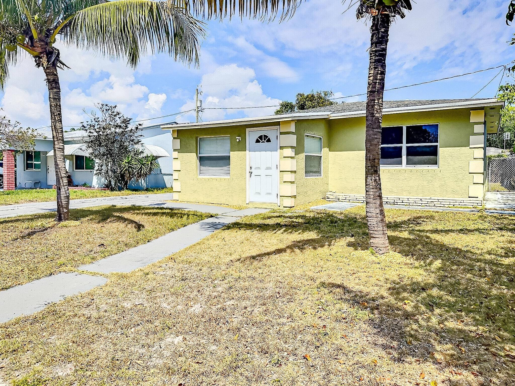 Welcome to this adorable 2 bedroom, 1 bath home, perfectly situated on a beautiful tree lined street in Lake Worth Beach !