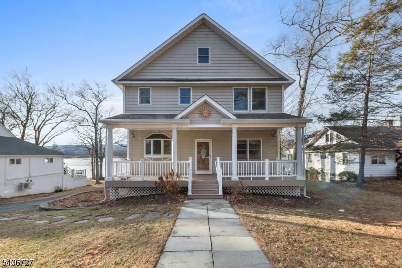 Are you looking for a 4 bedroom 4 full bath lakefront home on the eastern shores of Greenwood Lake in a private lake community with public utilities, private beach, clubhouse, ...