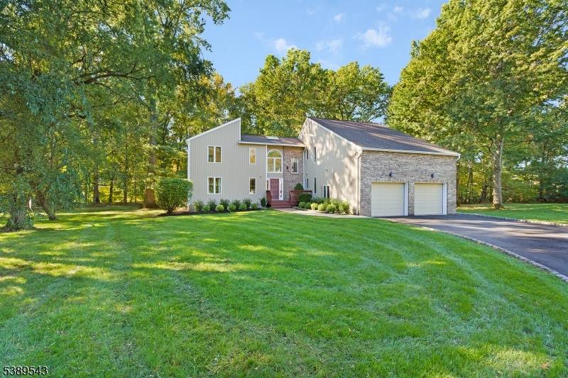 Tucked away at the end of a quiet cul de sac, this spacious 4 bedroom, 3 bath contemporary offers a flexible layout with two primary suites, including one conveniently located ...