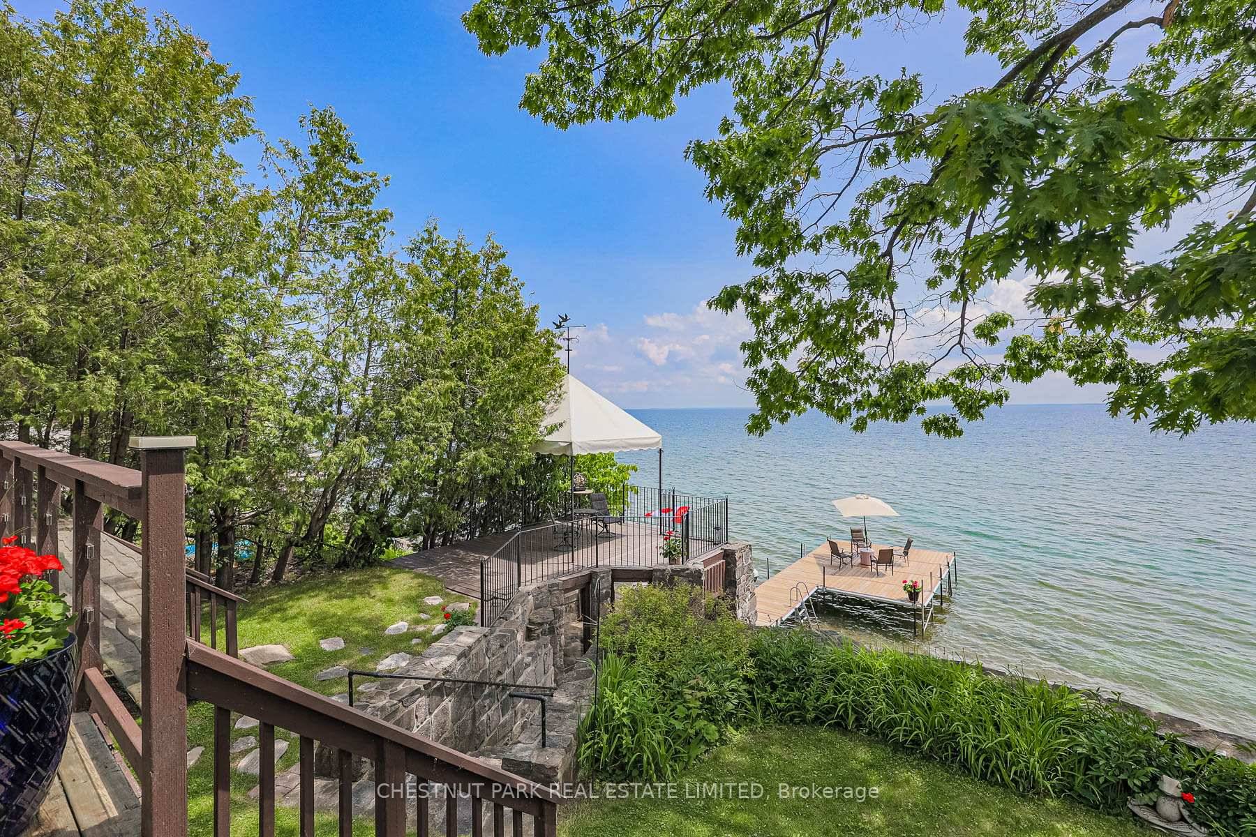 This exceptional 2011 custom built home offers the perfect blend of modern luxury and classic cottage charm.