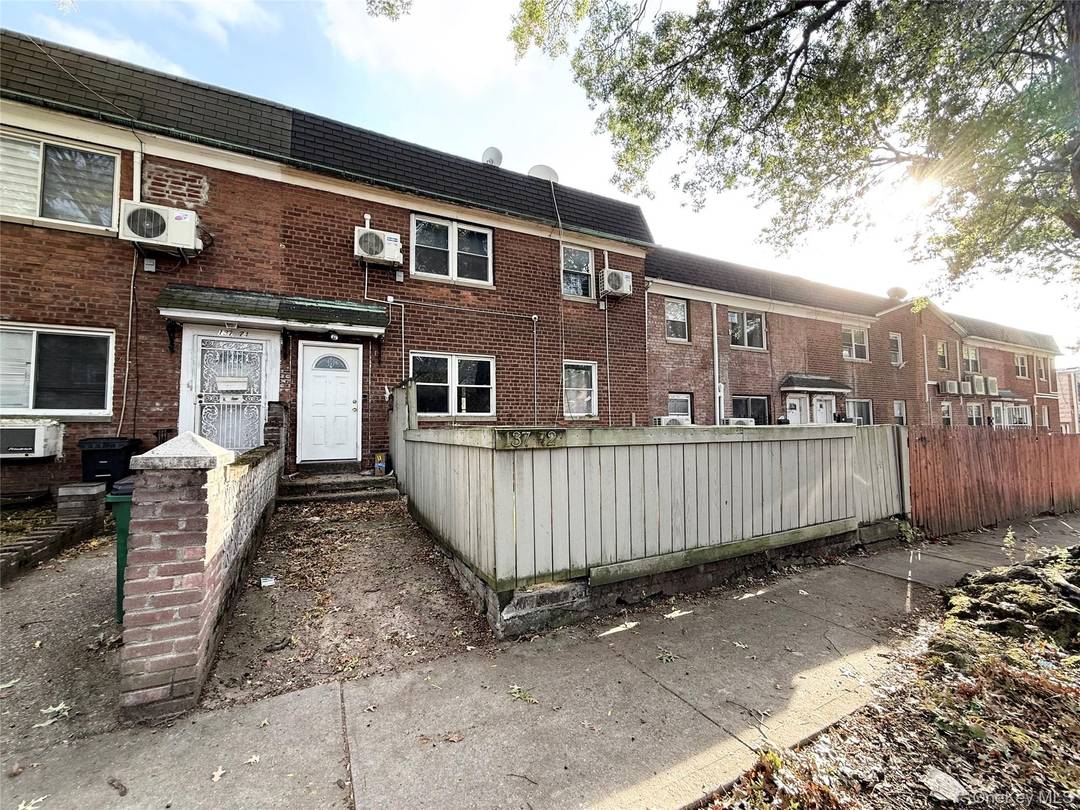 Amazing opportunity to own a large two family home in the heart of Kew Gardens Hills !