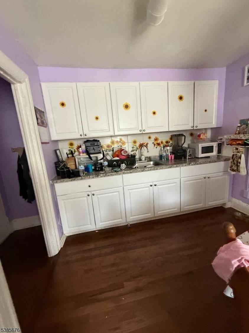 Well located and fully occupied, this 4 family property offers a great opportunity in the heart of Plainfield.
