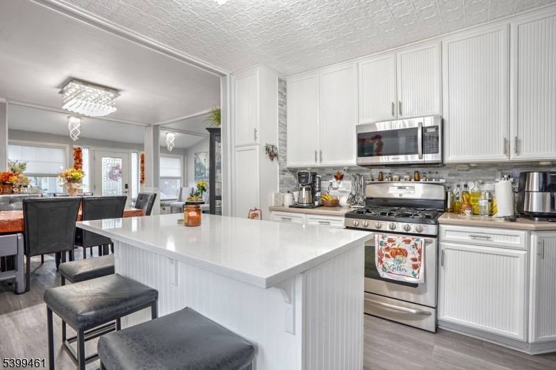 This spacious home offers 6 rooms, including 4 generously sized bedrooms and 2 full bathrooms.