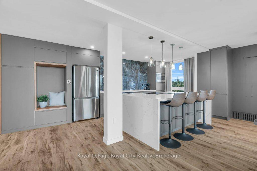 Experience modern living at 511 19 Woodlawn Rd E in Guelph, a beautifully renovated 3 bedroom, 2 bath condo offering 1387 sq ft of stylish, functional space.