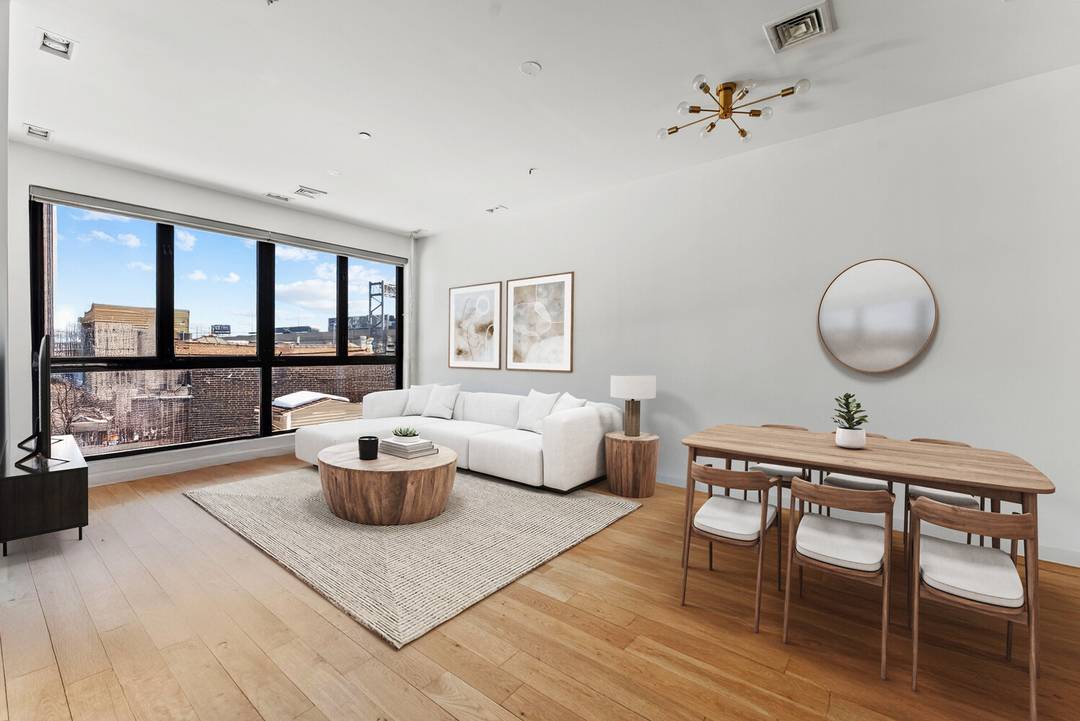 Outstanding and rare Greenpoint triplex condo offering expansive layout, refined finishes, and exceptional outdoor space.