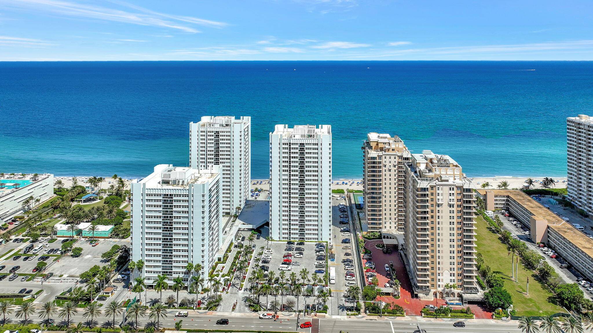 Wake up to panoramic ocean views from every window in this beautifully remodeled condo, featuring two spacious master suites, each with its own luxurious ensuite bathroom.
