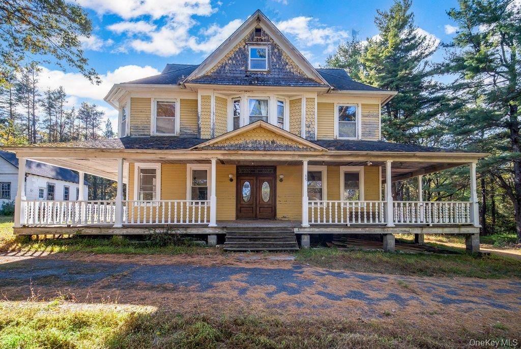 Nestled on over 11 acres of serene, wooded land in a peaceful Sullivan County community, this classic 6 bedroom, 1 bath Victorian stands as a testament to timeless architecture and ...
